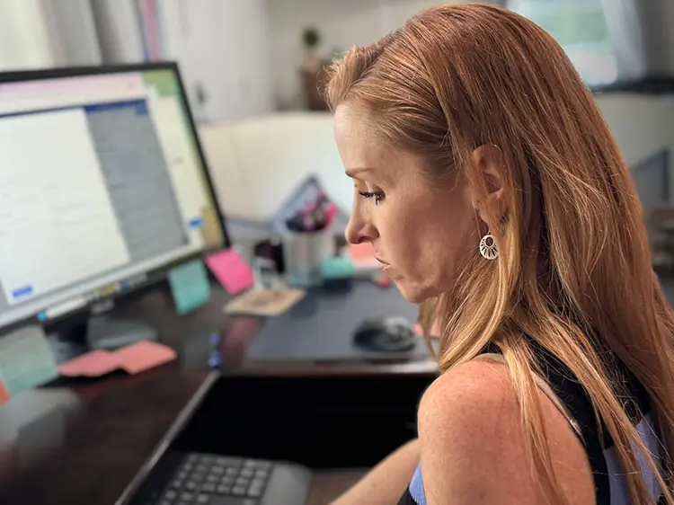 Chrissy Bradley working on research for a case at the Covington Office